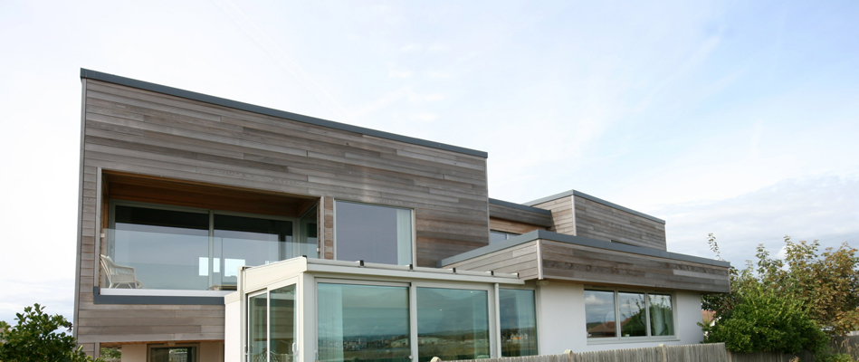 Additional storey, extension and refurbishment of bungalow by the sea