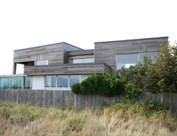 Additional storey, extension and refurbishment of bungalow by the sea